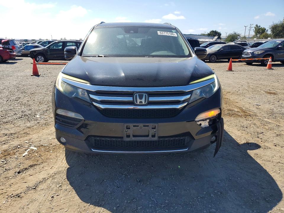 Photo 5 from auction – 2017 HONDA PILOT with VIN 5FNYF5H97HB016193