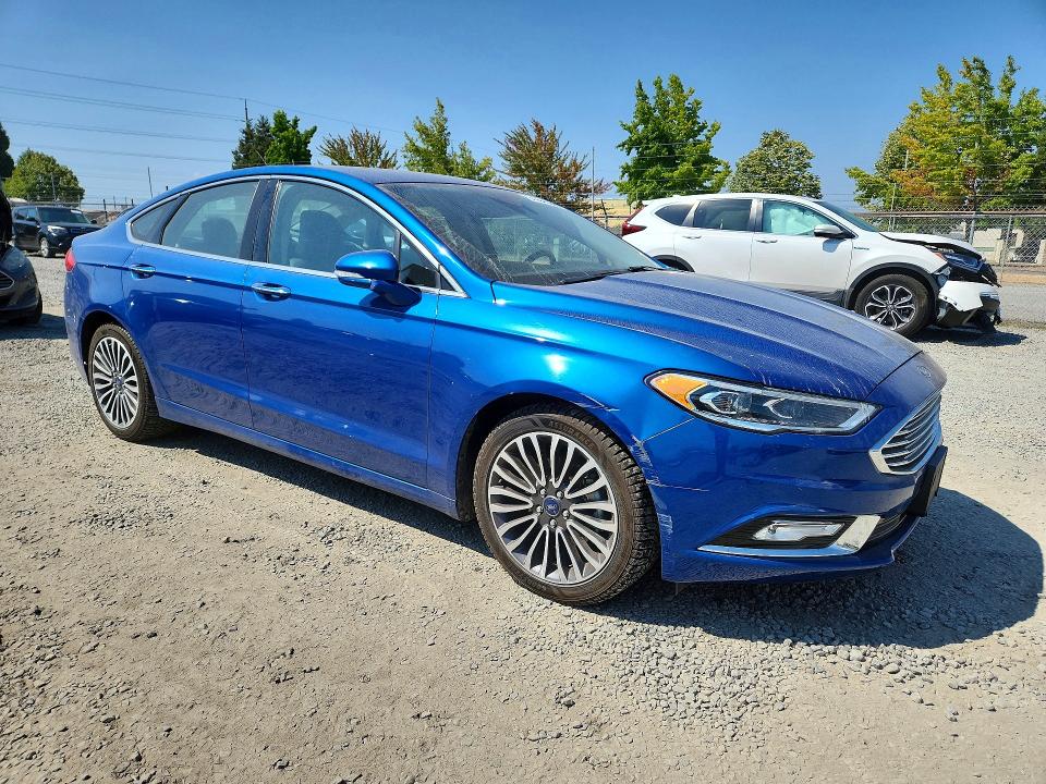 Photo 4 from auction – 2017 FORD FUSION with VIN 3FA6P0HDXHR335099