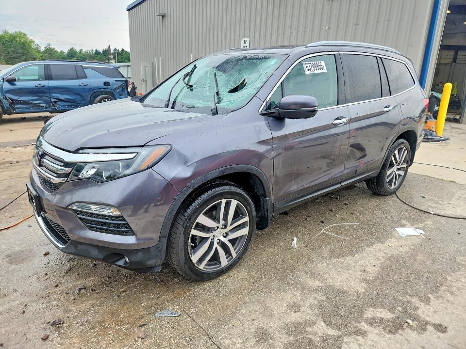 HONDA PILOT 2017 с VIN 5FNYF6H02HB087275 - Фото с аукциона