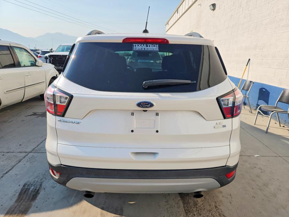 Photo 6 from auction – 2018 FORD ESCAPE with VIN 1FMCU9GD7JUB38526
