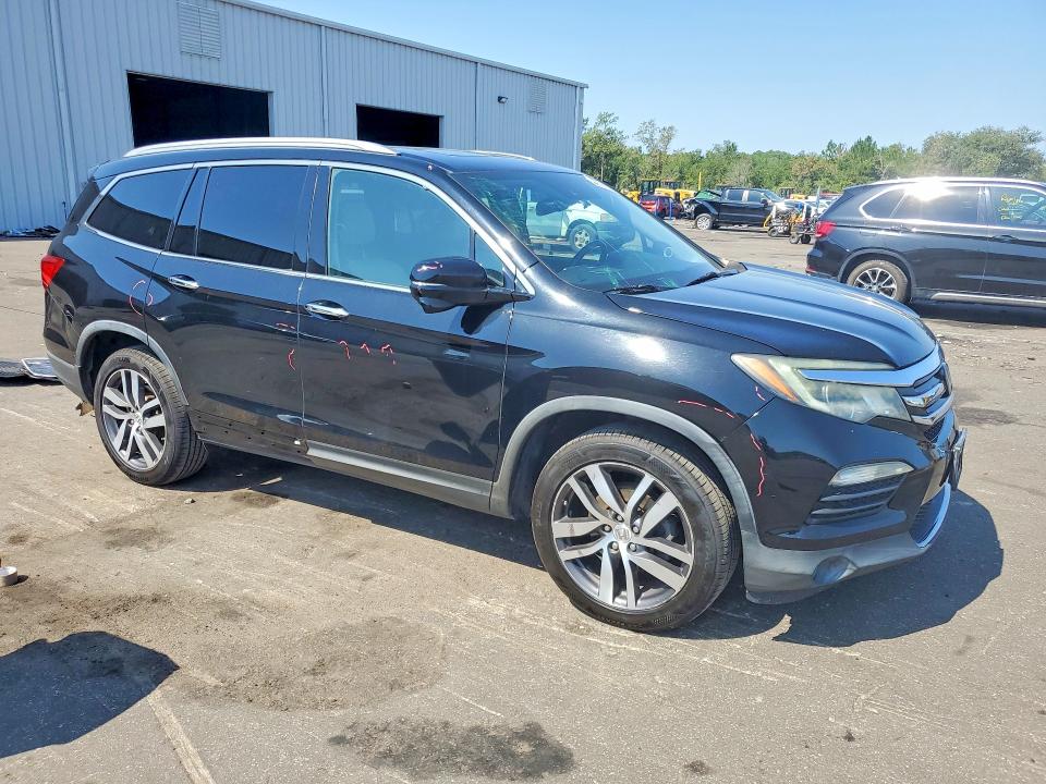 Photo 4 from auction – 2016 HONDA PILOT with VIN 5FNYF6H96GB124373