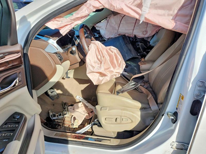 Photo 7 from auction – 2014 CADILLAC SRX with VIN 3GYFNEE31ES586245