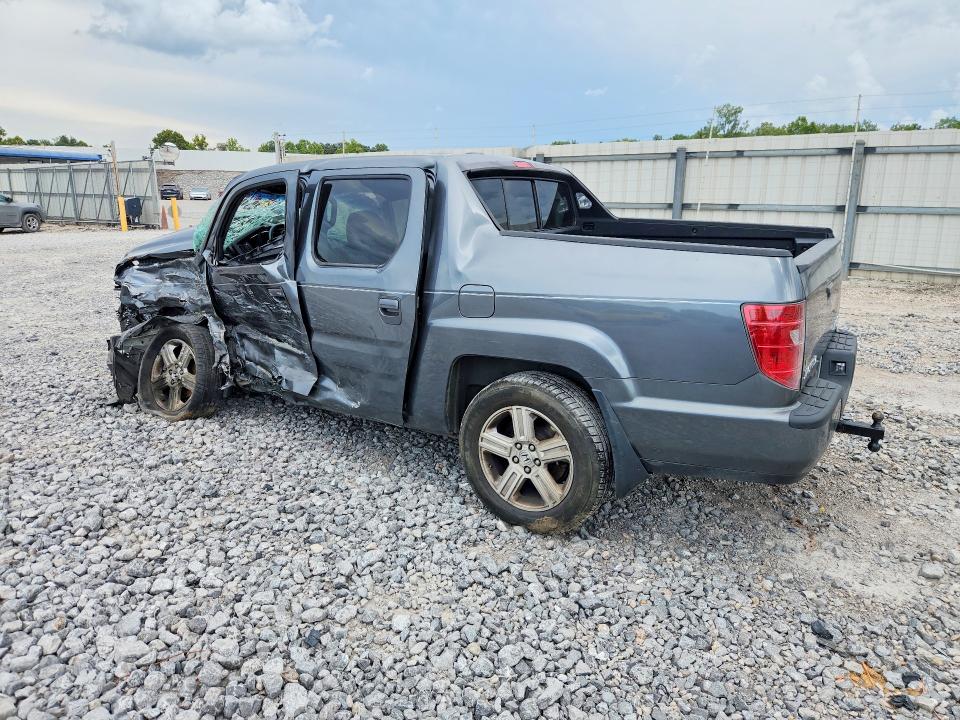Photo 2 from auction – 2010 HONDA RIDGELINE with VIN 5FPYK1F50AB001410