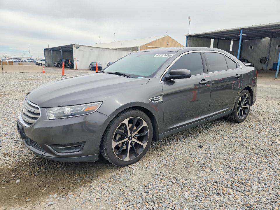 FORD TAURUS 2015 with VIN 1FAHP2E82FG195758 - Photo from auction