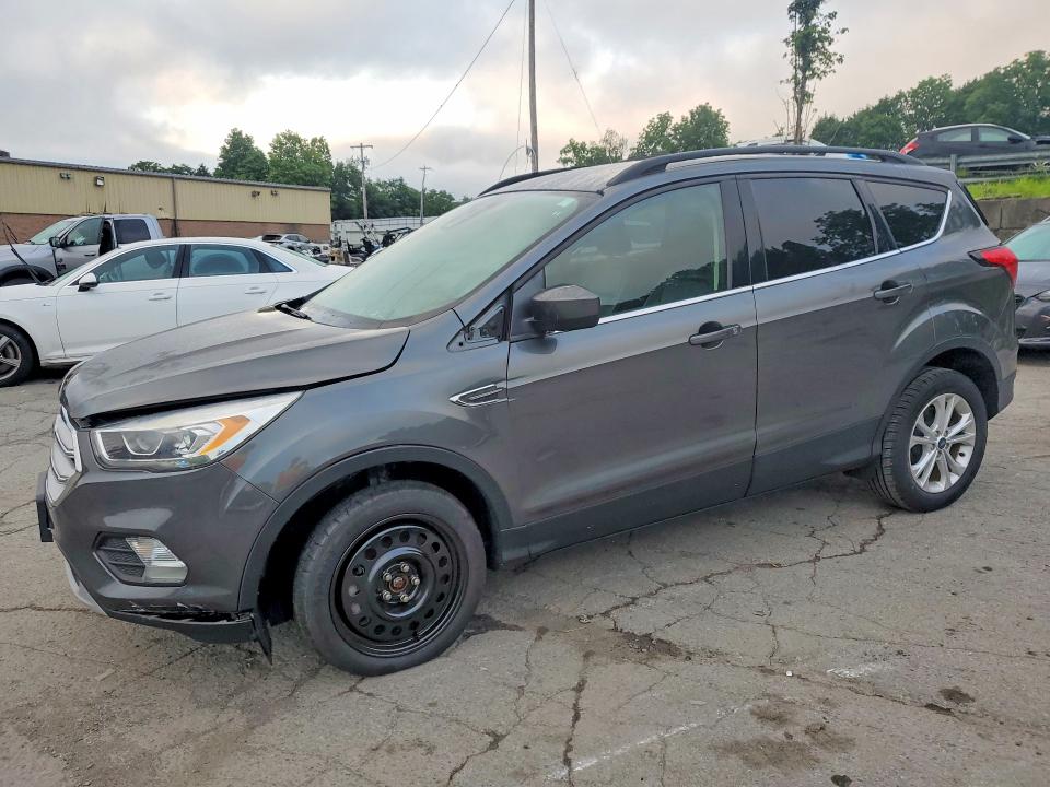 FORD ESCAPE 2019 with VIN 1FMCU9HDXKUA84560 - Photo from auction