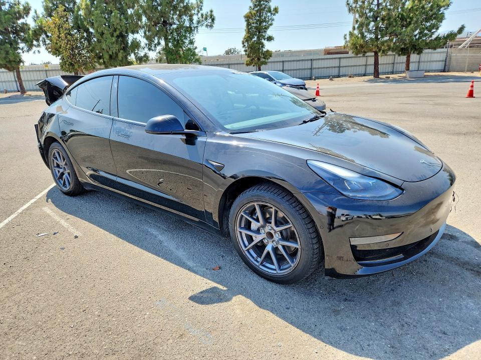 Photo 4 from auction – 2022 TESLA MODEL 3 with VIN 5YJ3E1EA6NF287553