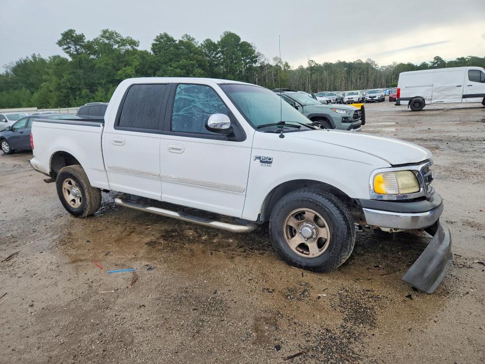 Photo 4 from auction – 2002 FORD F150 with VIN 1FTRW07L72KC40403