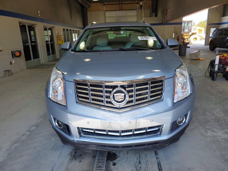 Photo 5 from auction – 2013 CADILLAC SRX with VIN 3GYFNDE35DS590081