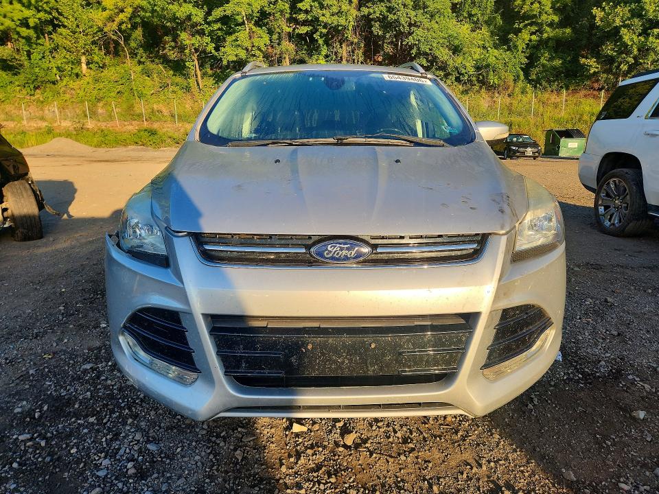 Photo 5 from auction – 2015 FORD ESCAPE with VIN 1FMCU0JX4FUB55113