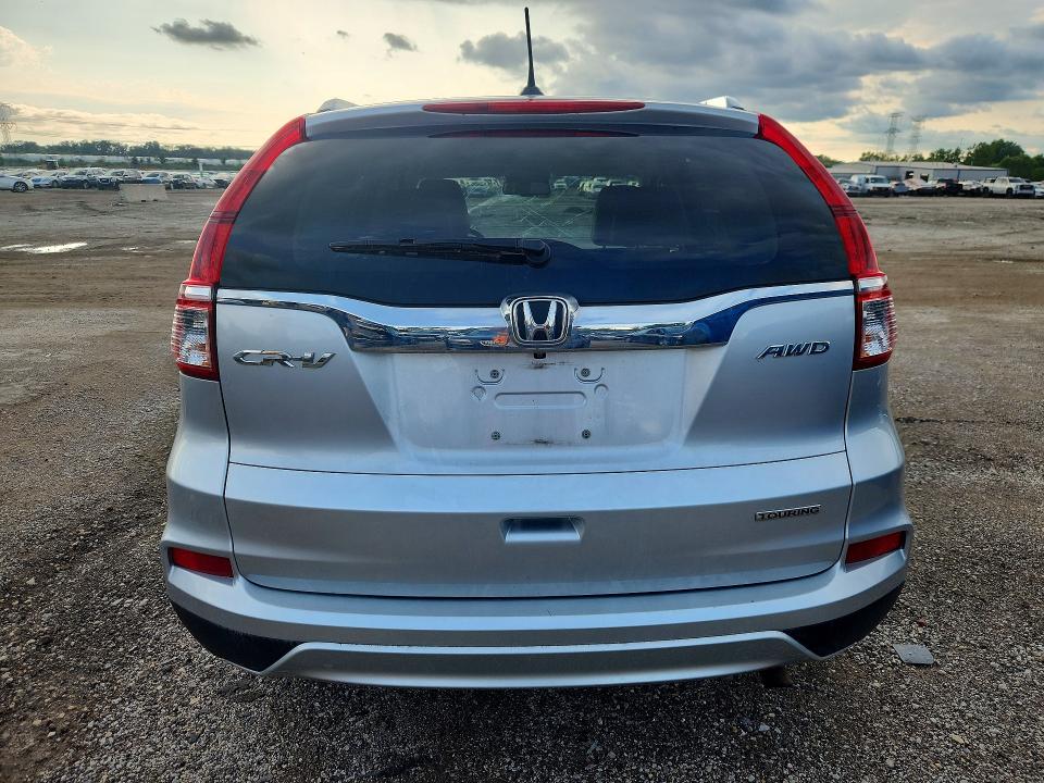 Photo 6 from auction – 2016 HONDA CR-V with VIN 5J6RM4H90GL101032