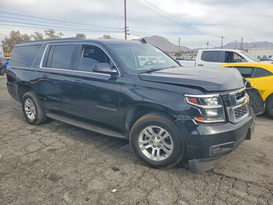 Photo 4 from auction – 2019 CHEVROLET SUBURBAN with VIN 1GNSCHKC5KR168955