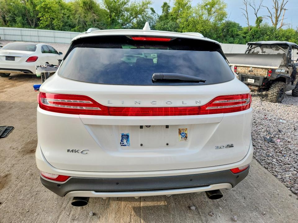 Photo 6 from auction – 2016 LINCOLN MKC with VIN 5LMCJ2D90GUJ01050