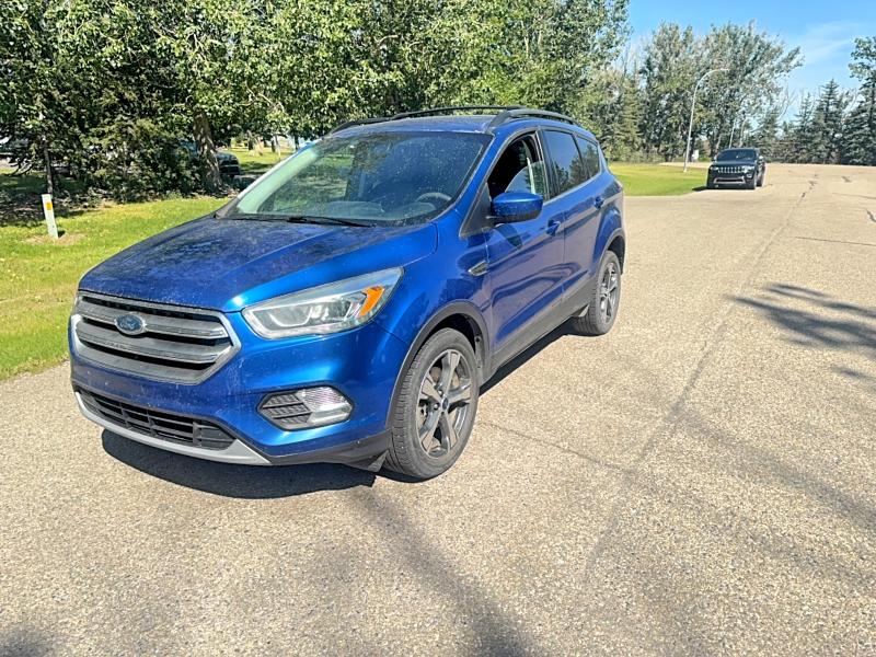 Photo 2 from auction – 2017 FORD ESCAPE with VIN 1FMCU9G95HUA55909