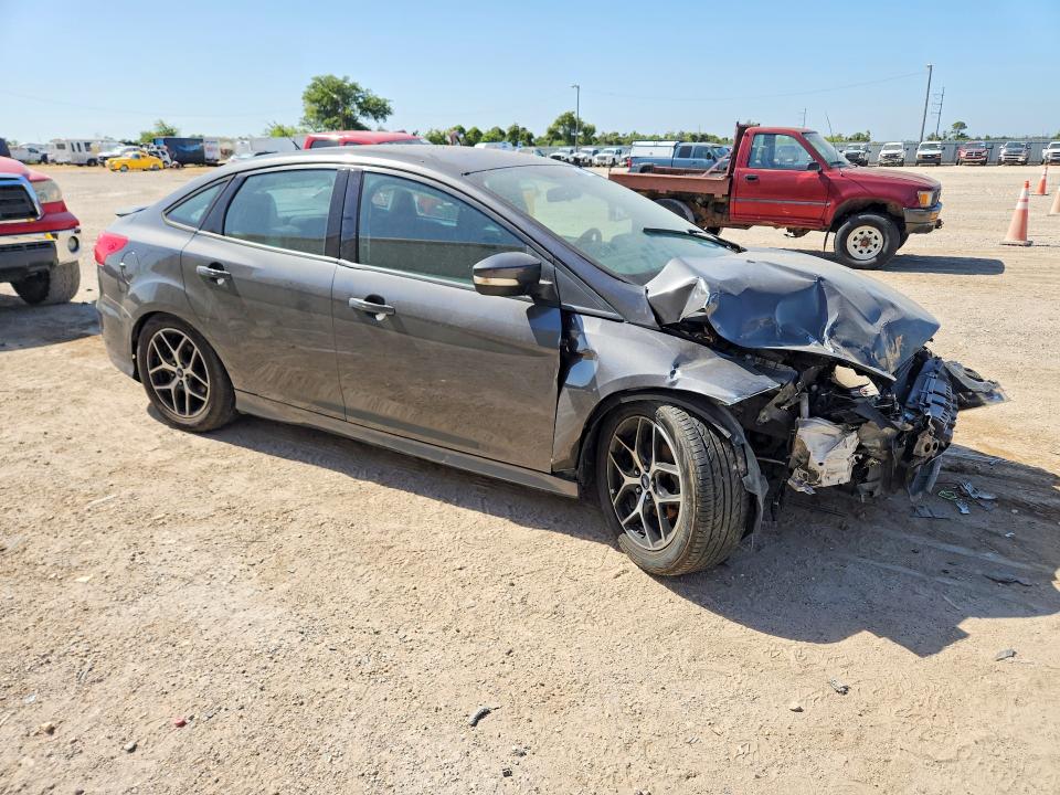Photo 4 from auction – 2015 FORD FOCUS with VIN 1FADP3F25FL357114