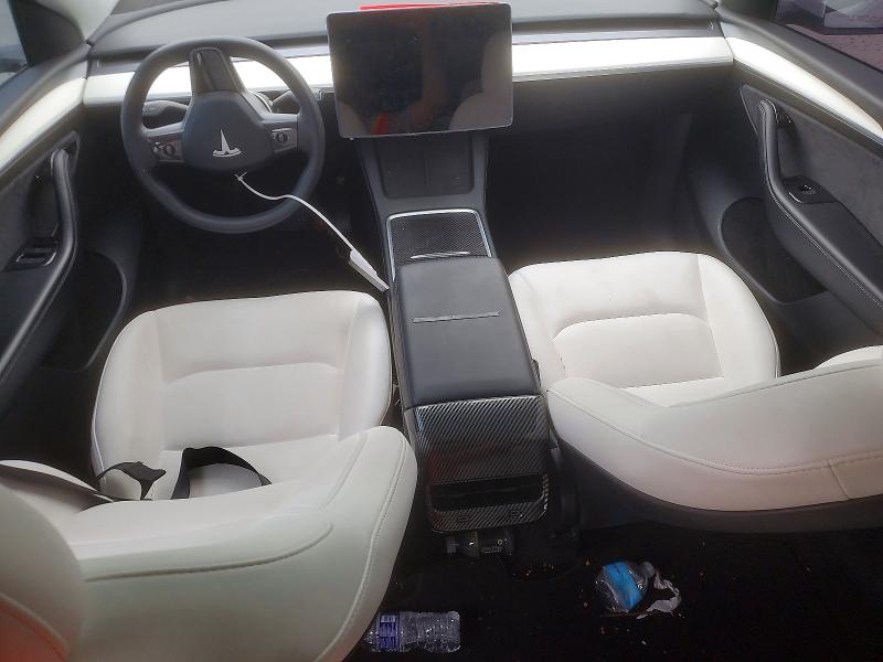 Photo 8 from auction – 2023 TESLA MODEL Y with VIN 7SAYGDEE7PF620207