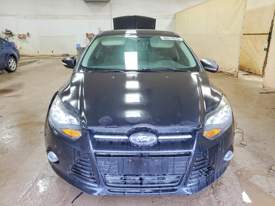 Photo 5 from auction – 2013 FORD FOCUS with VIN 1FADP3N24DL304015