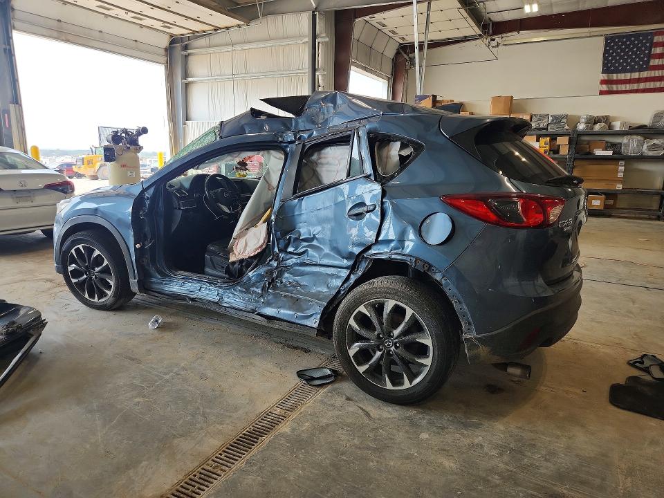 Снимка 2 от търг – 2016 MAZDA CX-5 с VIN JM3KE4DY4G0655782