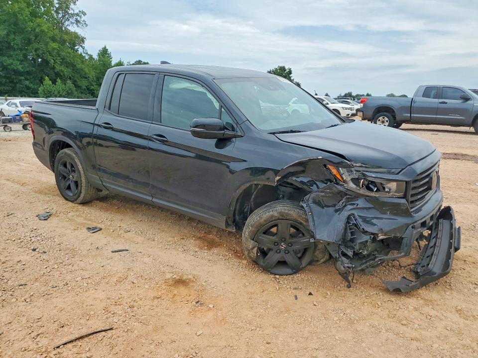 Photo 4 from auction – 2023 HONDA RIDGELINE with VIN 5FPYK3F83PB026154