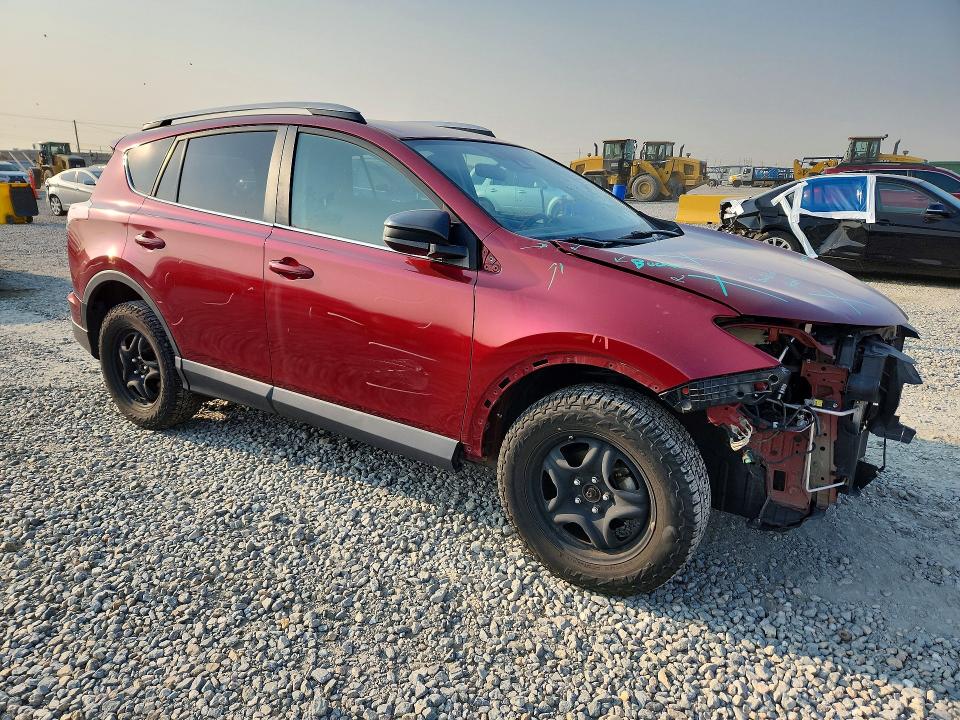 Photo 4 from auction – 2018 TOYOTA RAV4 with VIN 2T3BFREV7JW725950