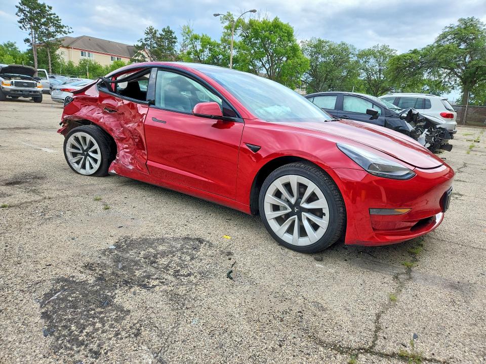 Photo 4 from auction – 2022 TESLA MODEL 3 with VIN 5YJ3E1EA9NF304703