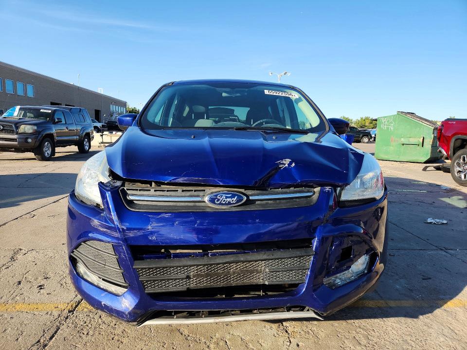 Foto 5 de la subasta – 2016 FORD ESCAPE con VIN 1FMCU0G76GUB16998