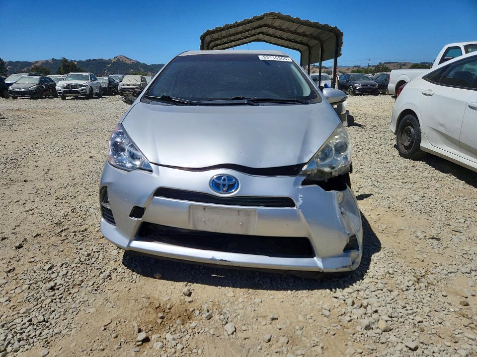 Photo 5 from auction – 2012 TOYOTA PRIUS C with VIN JTDKDTB37C1002638