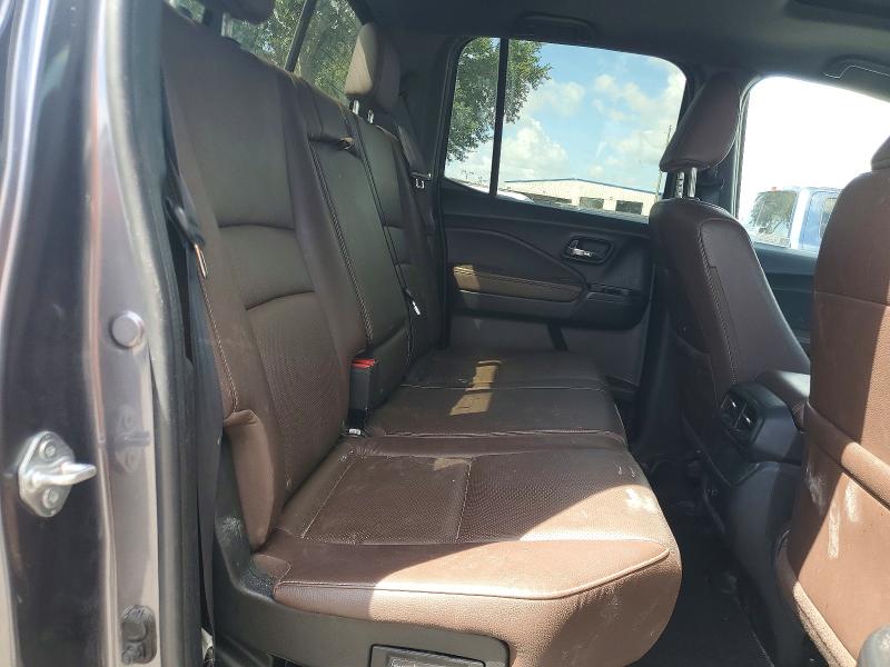 Снимка 11 от търг – 2024 HONDA RIDGELINE с VIN 5FPYK3F58RB015658