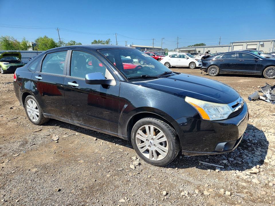 Photo 4 from auction – 2011 FORD FOCUS with VIN 1FAHP3HN5BW201866
