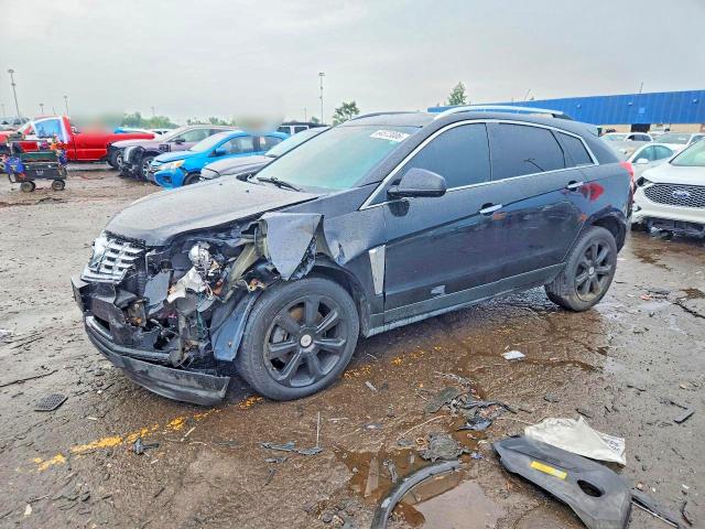 CADILLAC SRX 2013 with VIN 3GYFNHE35DS652344 - Photo from auction