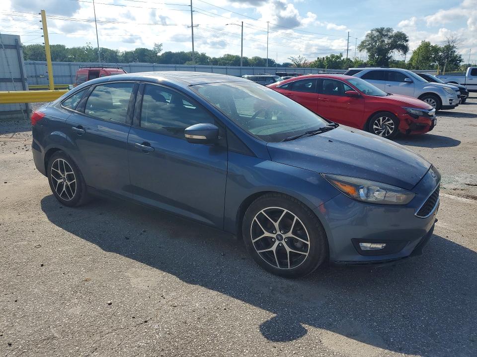 Photo 4 from auction – 2018 FORD FOCUS with VIN 1FADP3H26JL277892