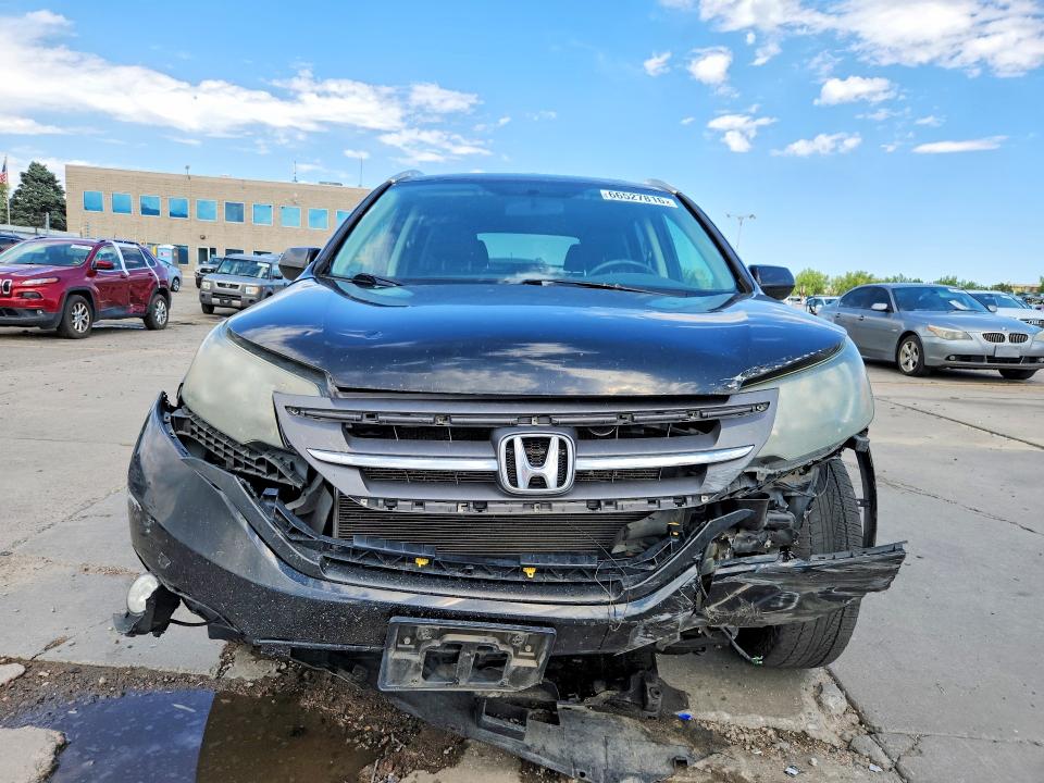 Photo 5 from auction – 2013 HONDA CR-V with VIN 2HKRM4H76DH672531