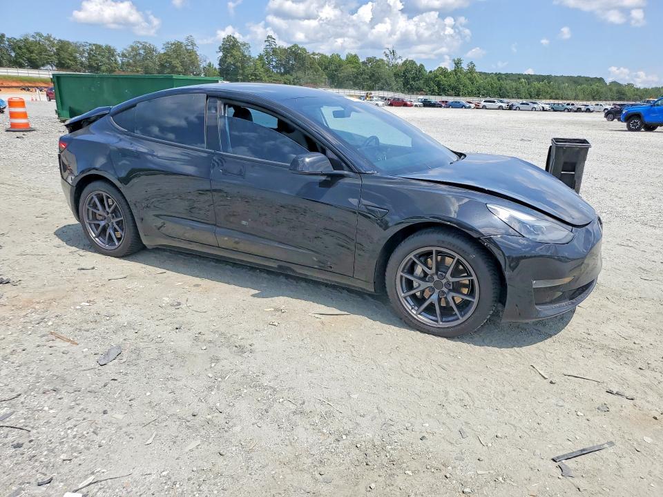 Photo 4 from auction – 2021 TESLA MODEL 3 with VIN 5YJ3E1EB0MF033084