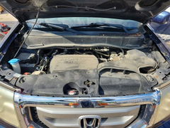 Photo 12 from auction – 2011 HONDA PILOT with VIN 5FNYF4H63BB040255