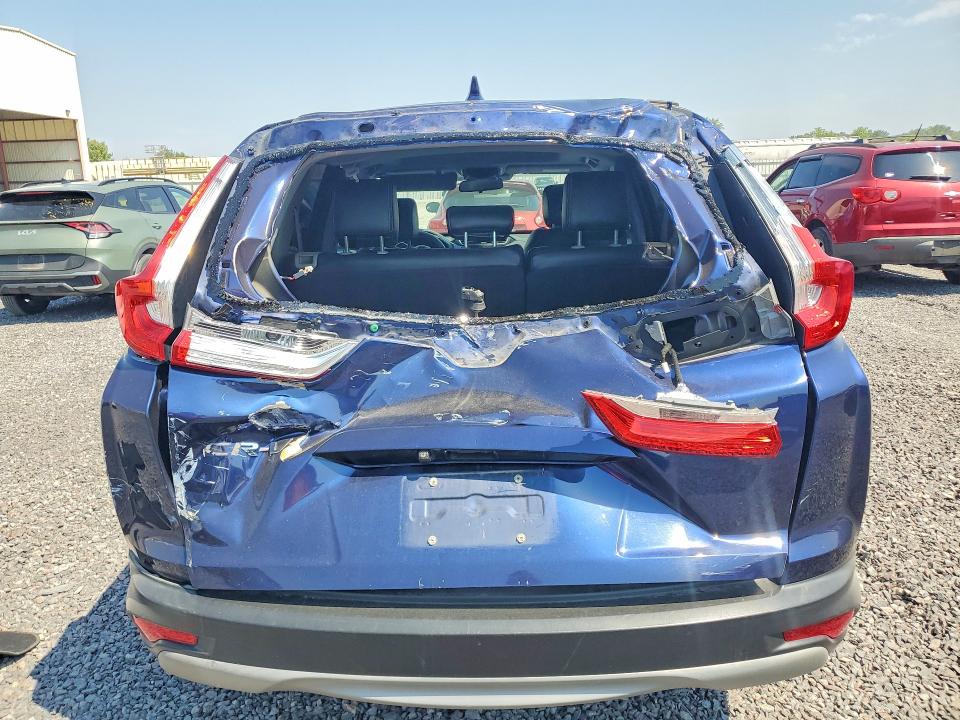 Photo 6 from auction – 2018 HONDA CR-V with VIN 7FARW2H51JE069269