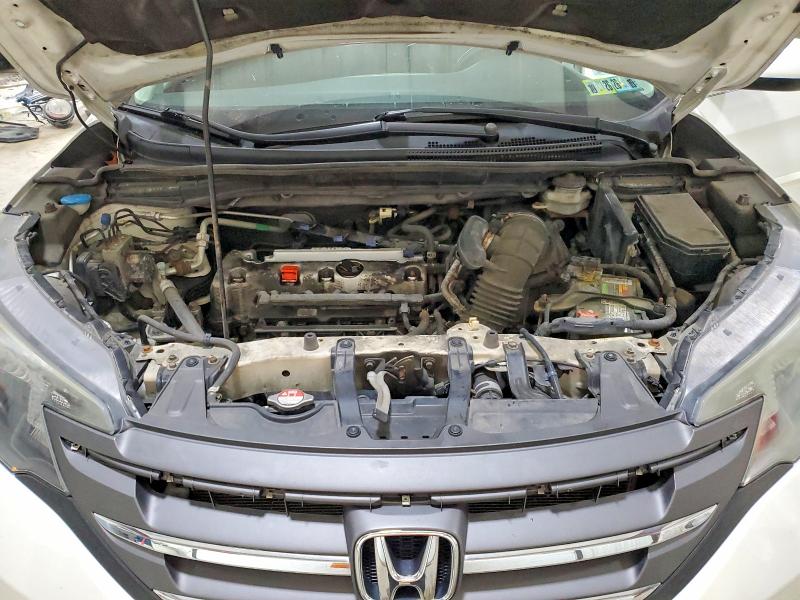 Photo 12 from auction – 2014 HONDA CR-V with VIN 5J6RM4H71EL011903