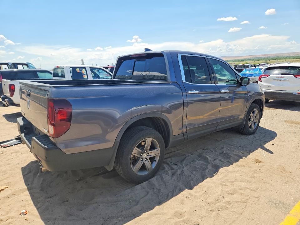 Photo 3 from auction – 2022 HONDA RIDGELINE with VIN 5FPYK3F78NB014831