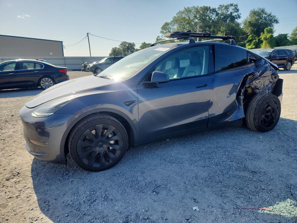 TESLA MODEL Y 2023 con VIN 7SAYGAEE7PF781557 - Foto de la subasta