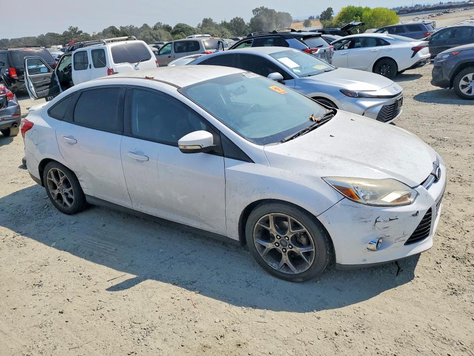 Photo 4 from auction – 2014 FORD FOCUS with VIN 1FADP3F21EL248213