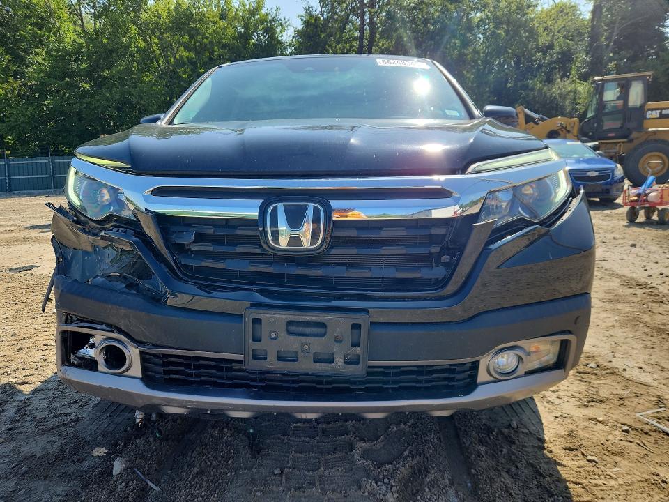 Photo 5 from auction – 2019 HONDA RIDGELINE with VIN 5FPYK3F79KB033674