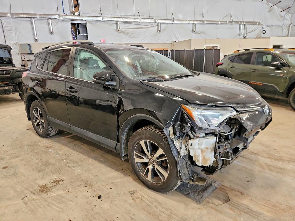 Photo 4 from auction – 2016 TOYOTA RAV4 with VIN 2T3RFREV1GW487696