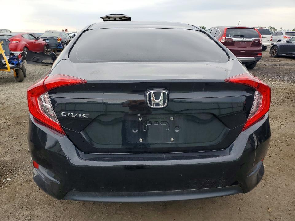 Photo 6 from auction – 2018 HONDA CIVIC with VIN 19XFC2F50JE003862