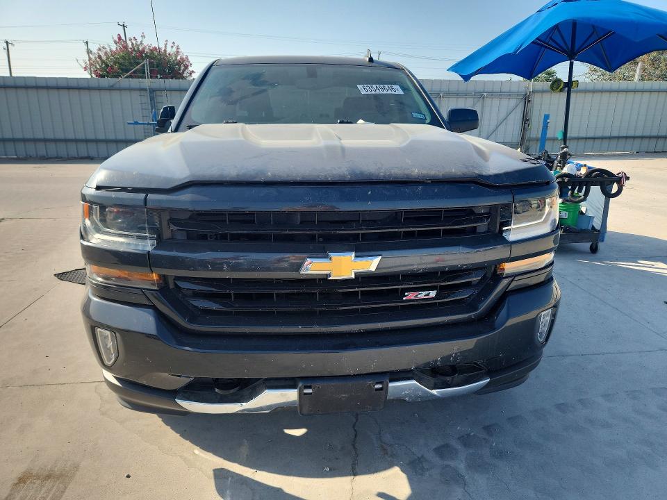 Photo 5 from auction – 2018 CHEVROLET SILVERADO with VIN 3GCUKREC4JG187940