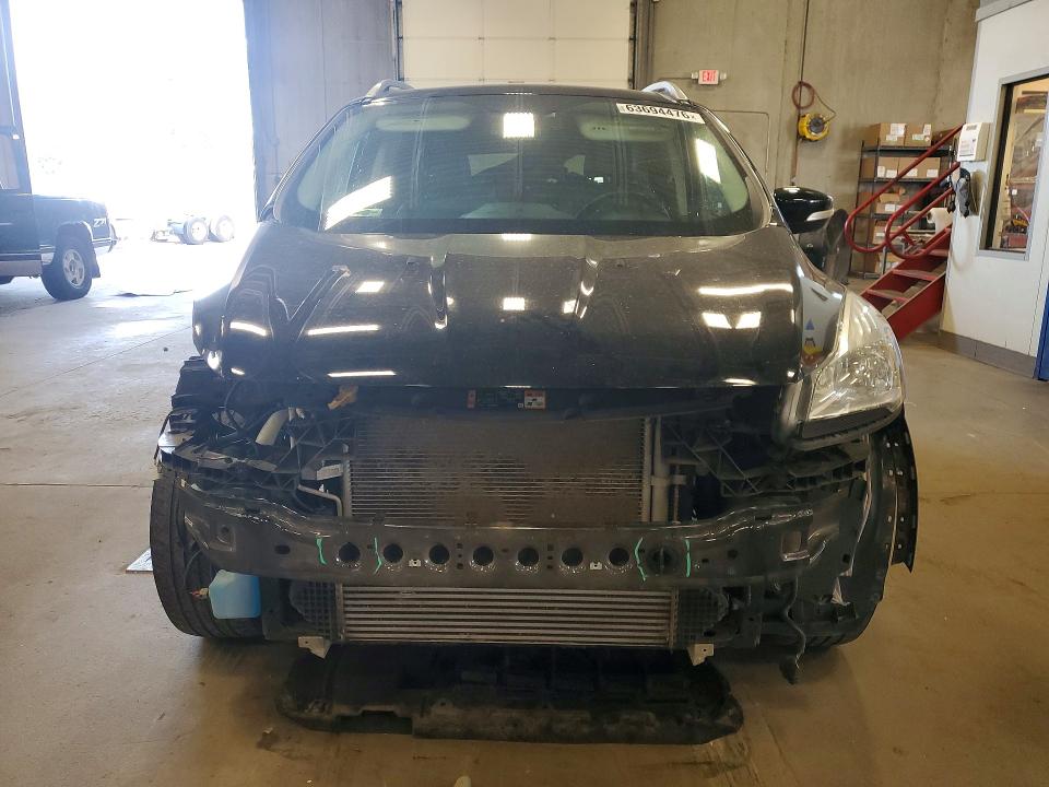 Photo 5 from auction – 2016 FORD ESCAPE with VIN 1FMCU9JX7GUC43238