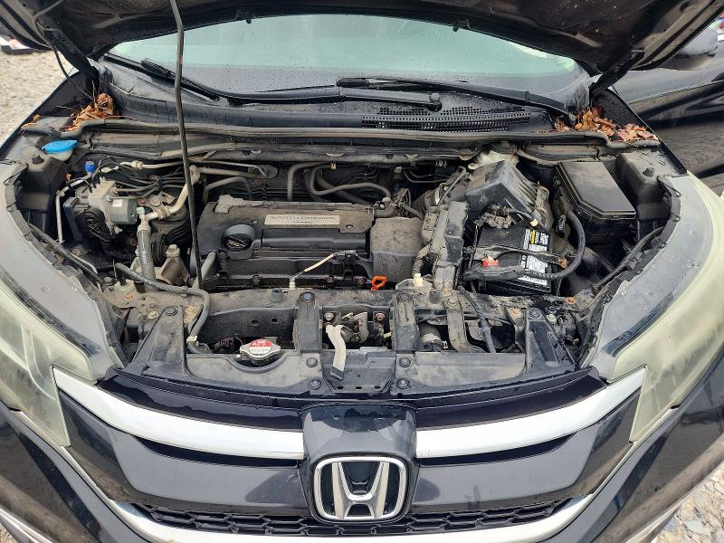 Photo 12 from auction – 2015 HONDA CR-V with VIN 2HKRM4H70FH611484