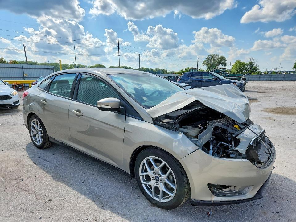 Photo 4 from auction – 2015 FORD FOCUS with VIN 1FADP3F2XFL255453