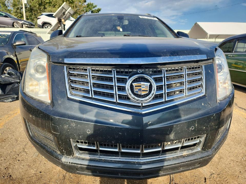 Photo 5 from auction – 2014 CADILLAC SRX with VIN 3GYFNBE32ES561482