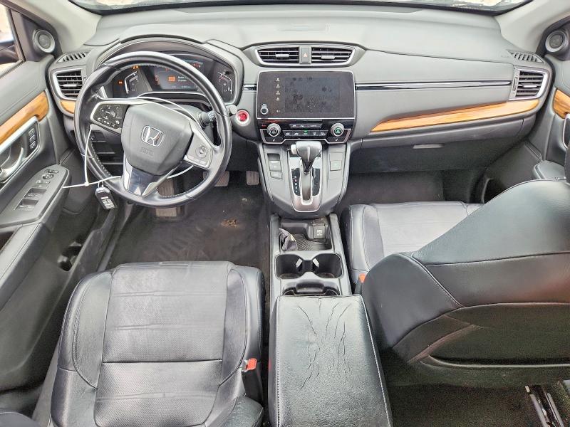 Photo 8 from auction – 2018 HONDA CR-V with VIN 7FARW2H87JE014058