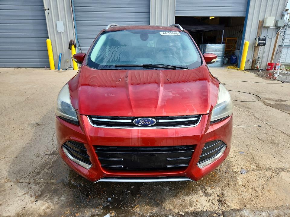 Foto 5 de la subasta – 2014 FORD ESCAPE con VIN 1FMCU0JX7EUB31726