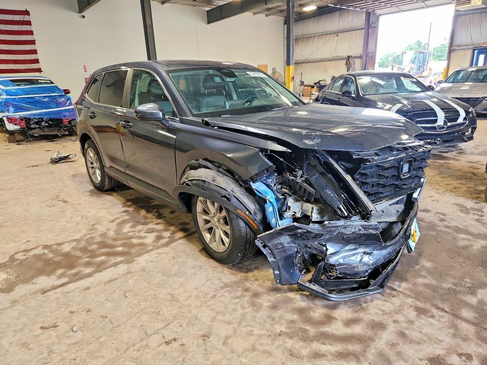 Photo 4 from auction – 2023 HONDA CR-V with VIN 2HKRS4H75PH418240