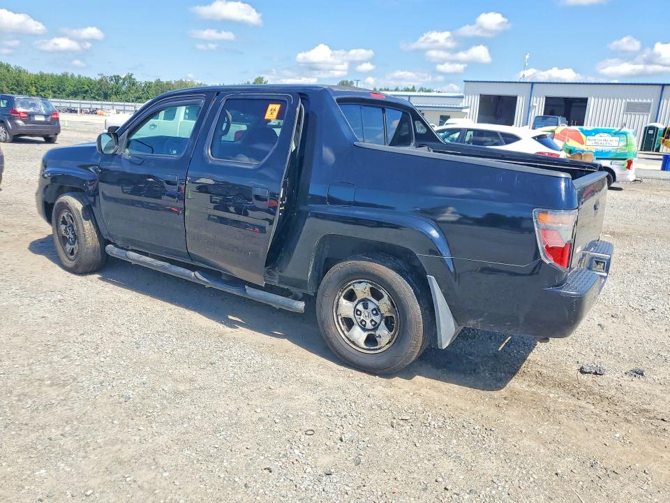 Photo 2 from auction – 2006 HONDA RIDGELINE with VIN 2HJYK16296H562202